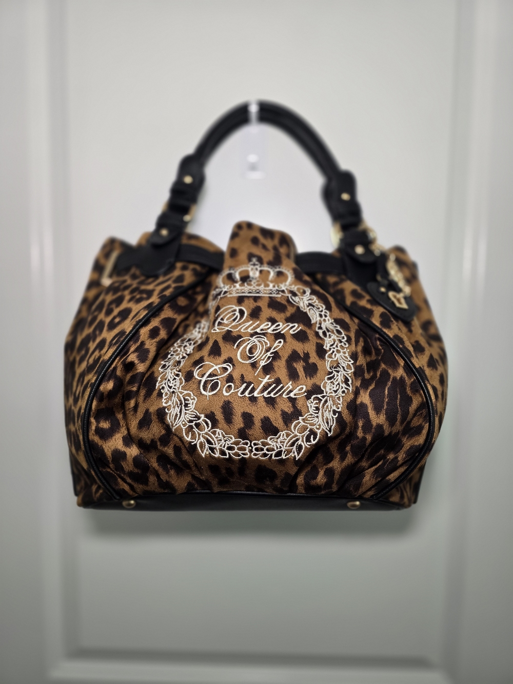 Juicy Couture Queen of Couture Dumpling Bag Leopard Print. NEW